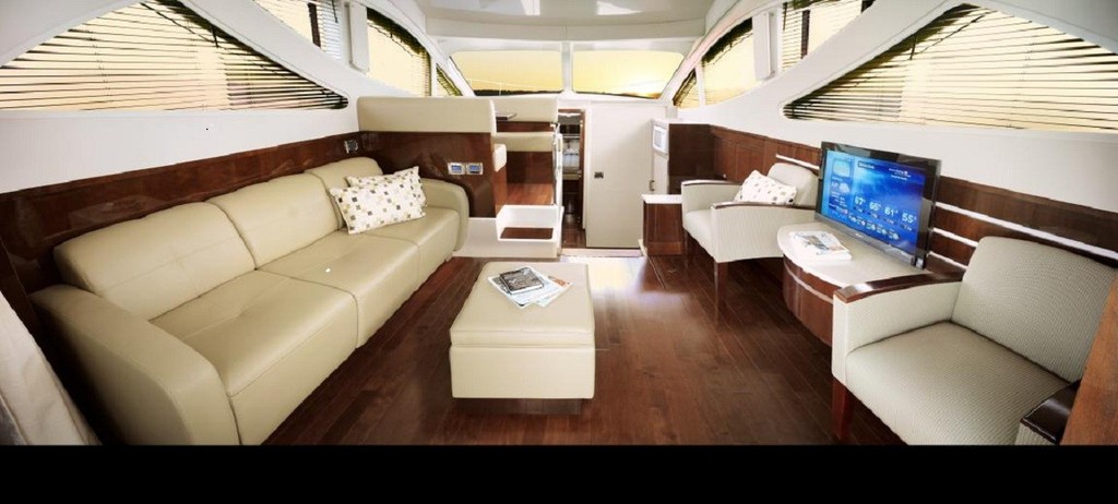 Superbly furnished, the delightful saloon aboard the 450 Sea Ray Sedan Bridge is luxury all the way. © Sea Ray Boats .